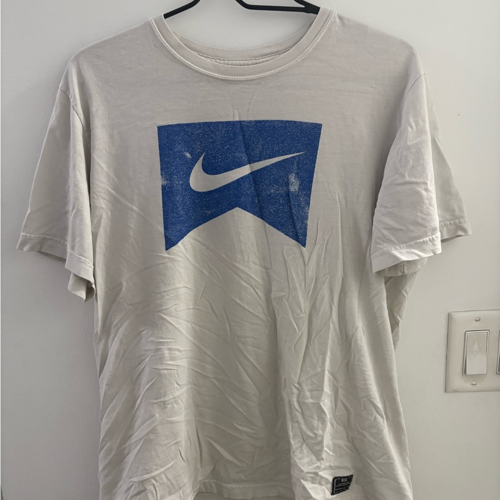 Nike Men's Cream Tee with Blue Graphic
